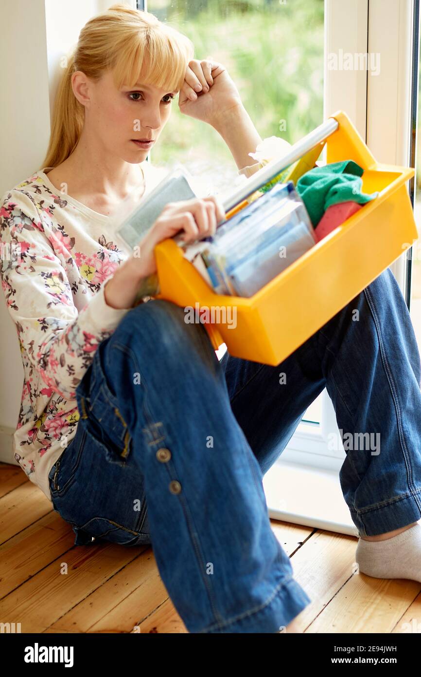 Woman tired of doing housework Stock Photo