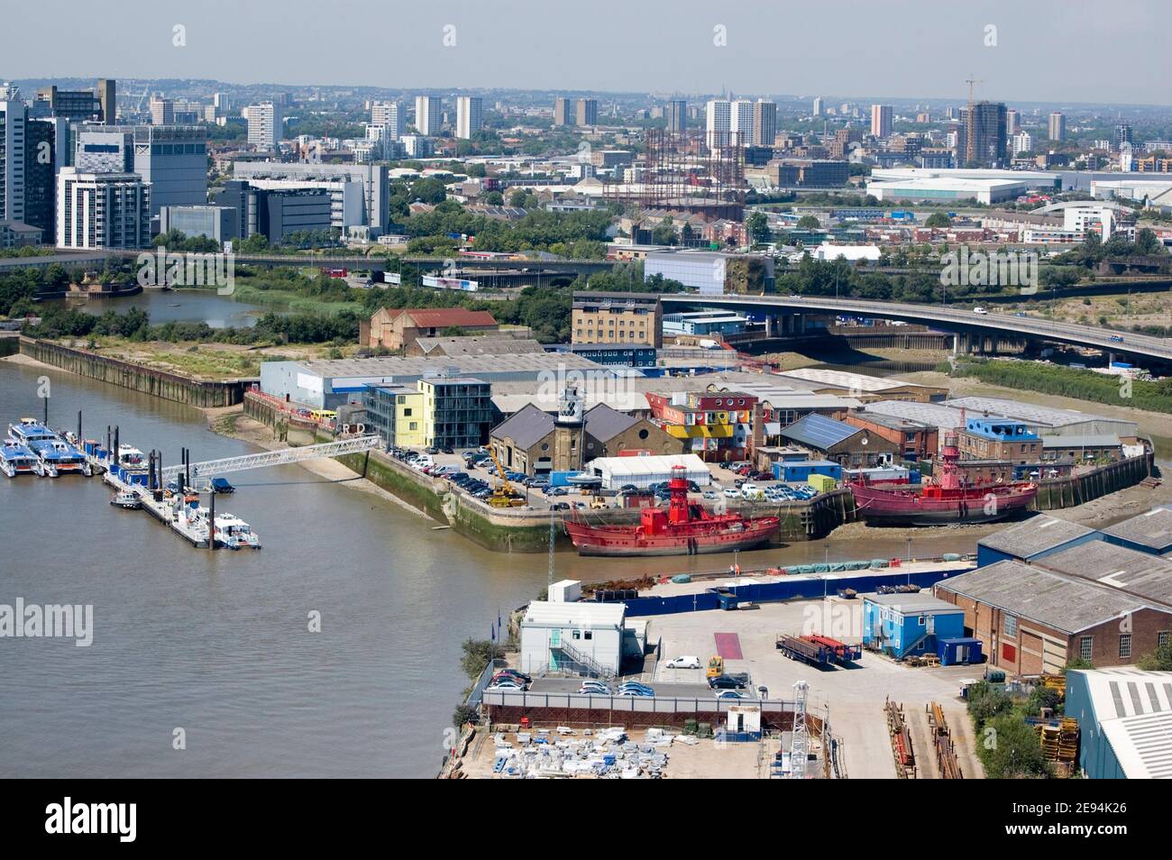 View from above of the River Thames and River Lea and the island with Trinity Buoy Wharf in Newham, East London. East India Dock basin behind View fro Stock Photo