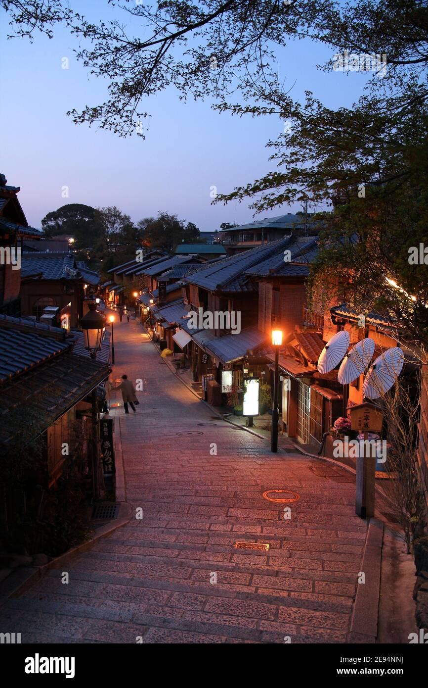 KYOTO, JAPAN - APRIL 17, 2012: People visit evening streets of Higashiyama old town district in Kyoto, Japan. Old Kyoto is a UNESCO World Heritage sit Stock Photo
