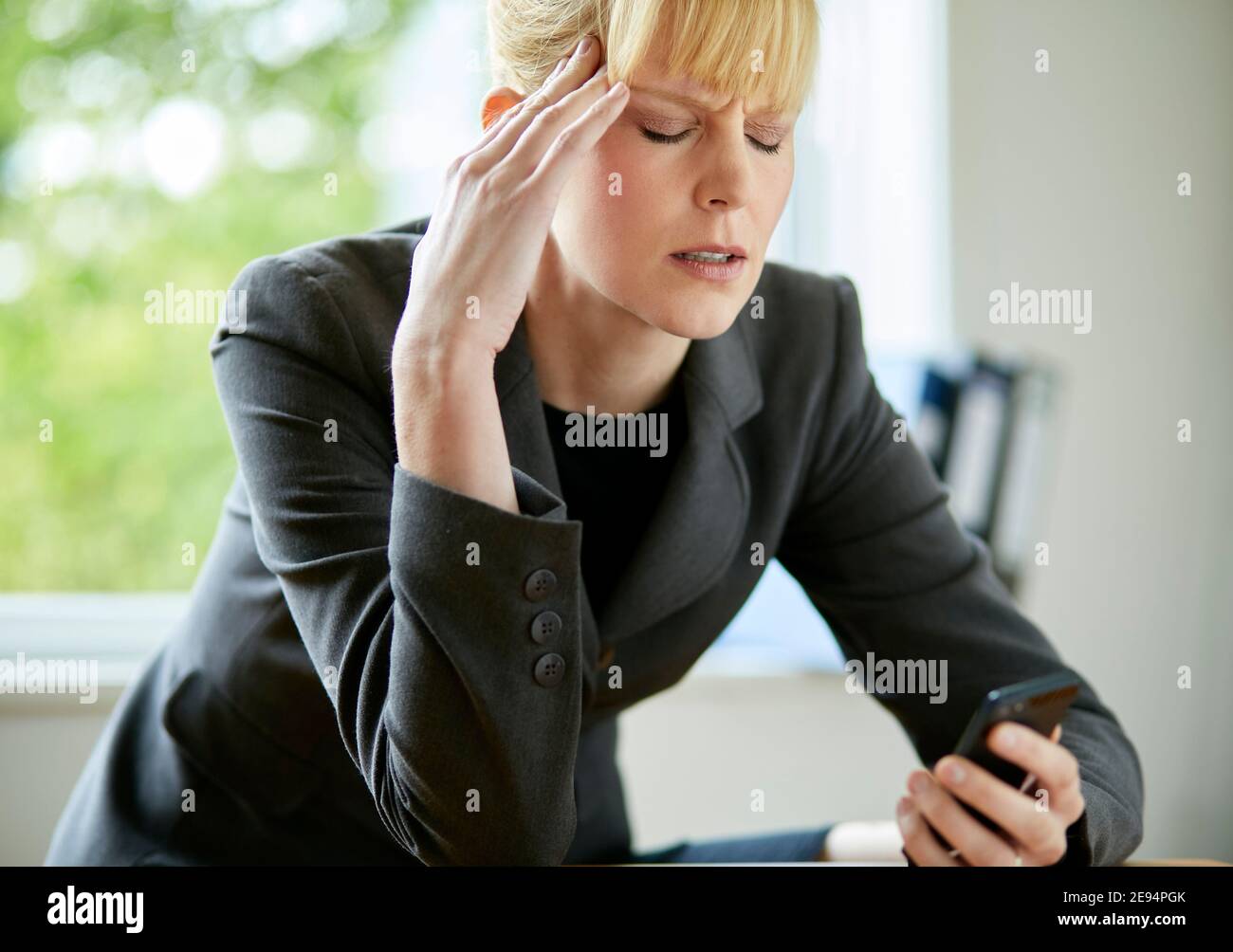 Stressed Businesswoman Stock Photo
