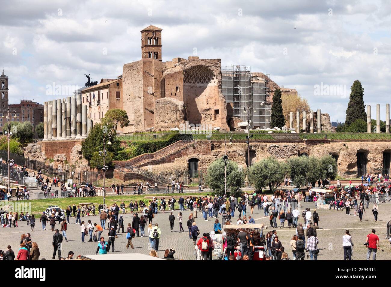 ROME, ITALY - APRIL 8, 2012: People visit ancient ruins in Rome ...