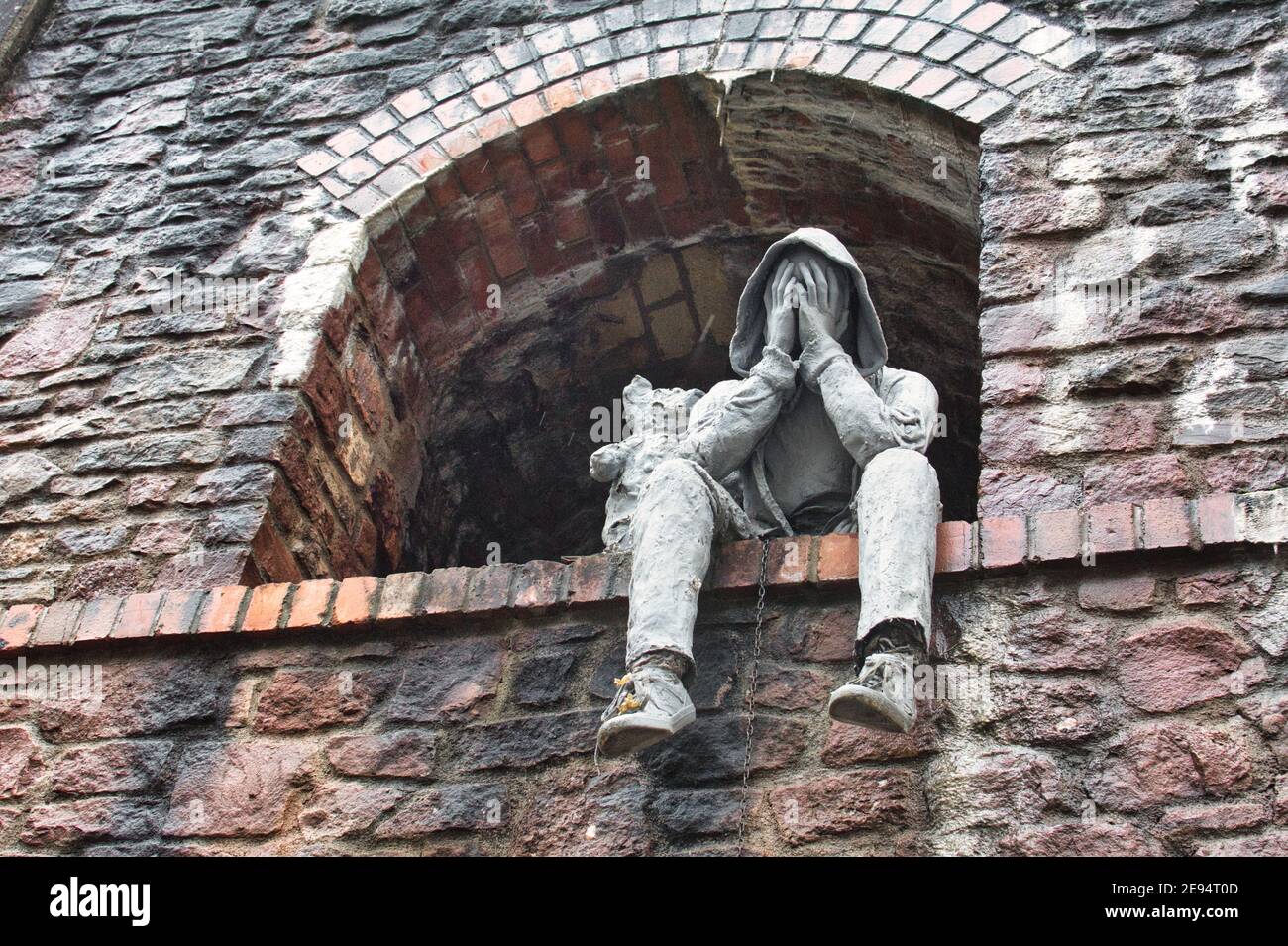 Upset male comforted by teddy bear statue in Bristol,UK Stock Photo Alamy