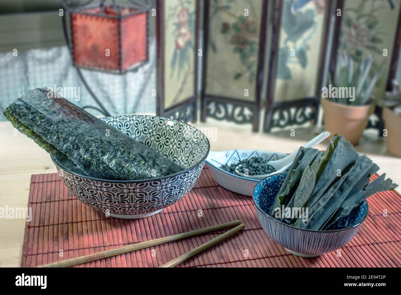 Still life with Japanese food. Edible seaweed: wakame, kombu and nori Stock Photo