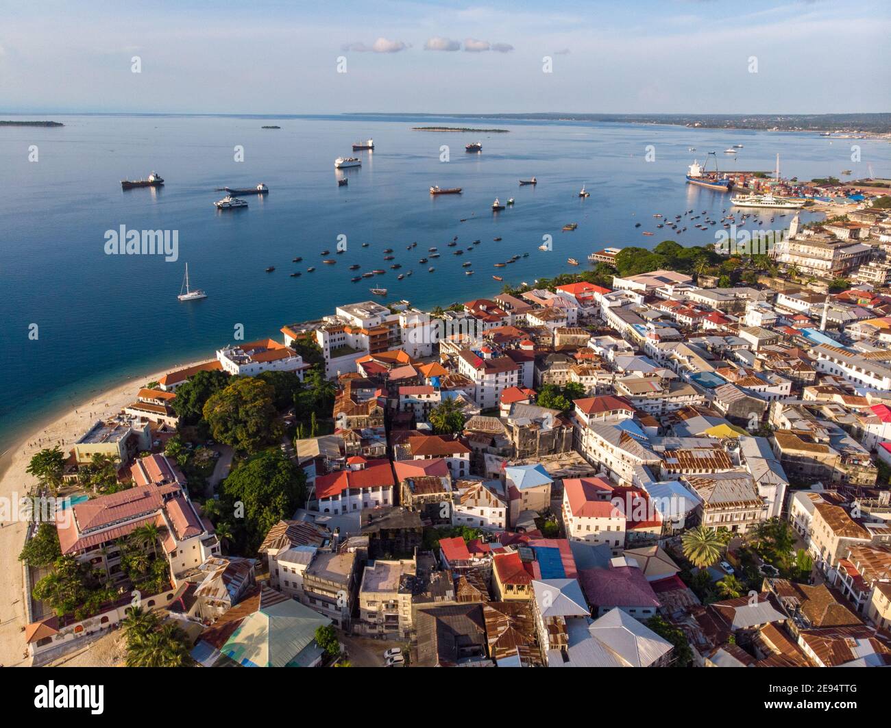 Zanzibar Aerial Shot Of Stone Town Beach With Traditional Dhow zanzibar-aerial-shot-of-stone-town-beach-with-traditional-dhow
