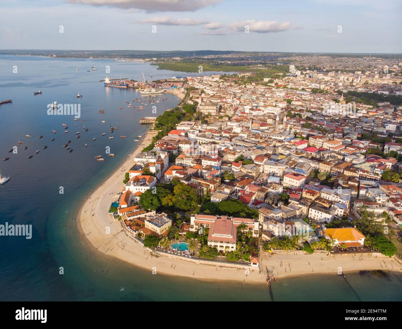 Zanzibar Aerial Shot Of Stone Town Beach With Traditional Dhow zanzibar-aerial-shot-of-stone-town-beach-with-traditional-dhow
