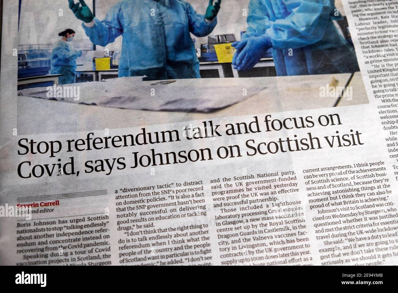 'Stop referendum talk and focus on Covid, says Johnson on Scottish visit' Guardian news newspaper headline inside page 29 January 2021 in London UK Stock Photo