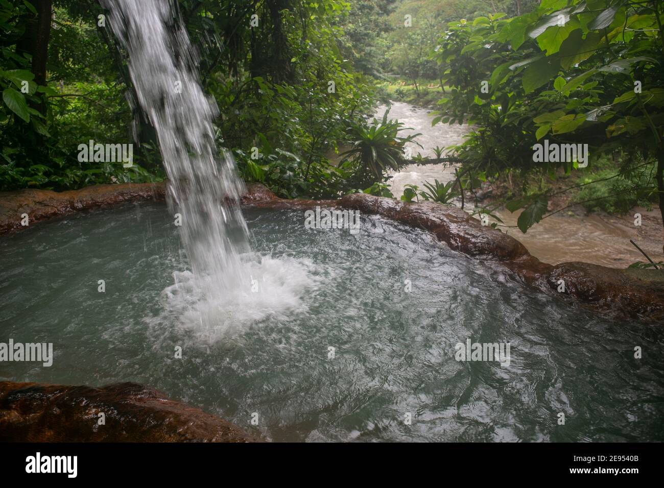 The waterfall and the pool in hot spring in La Fortuna, Costa Rica