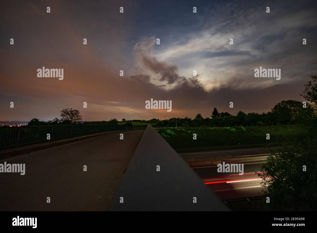 Light trails on a highway at night Stock Photo - Alamy