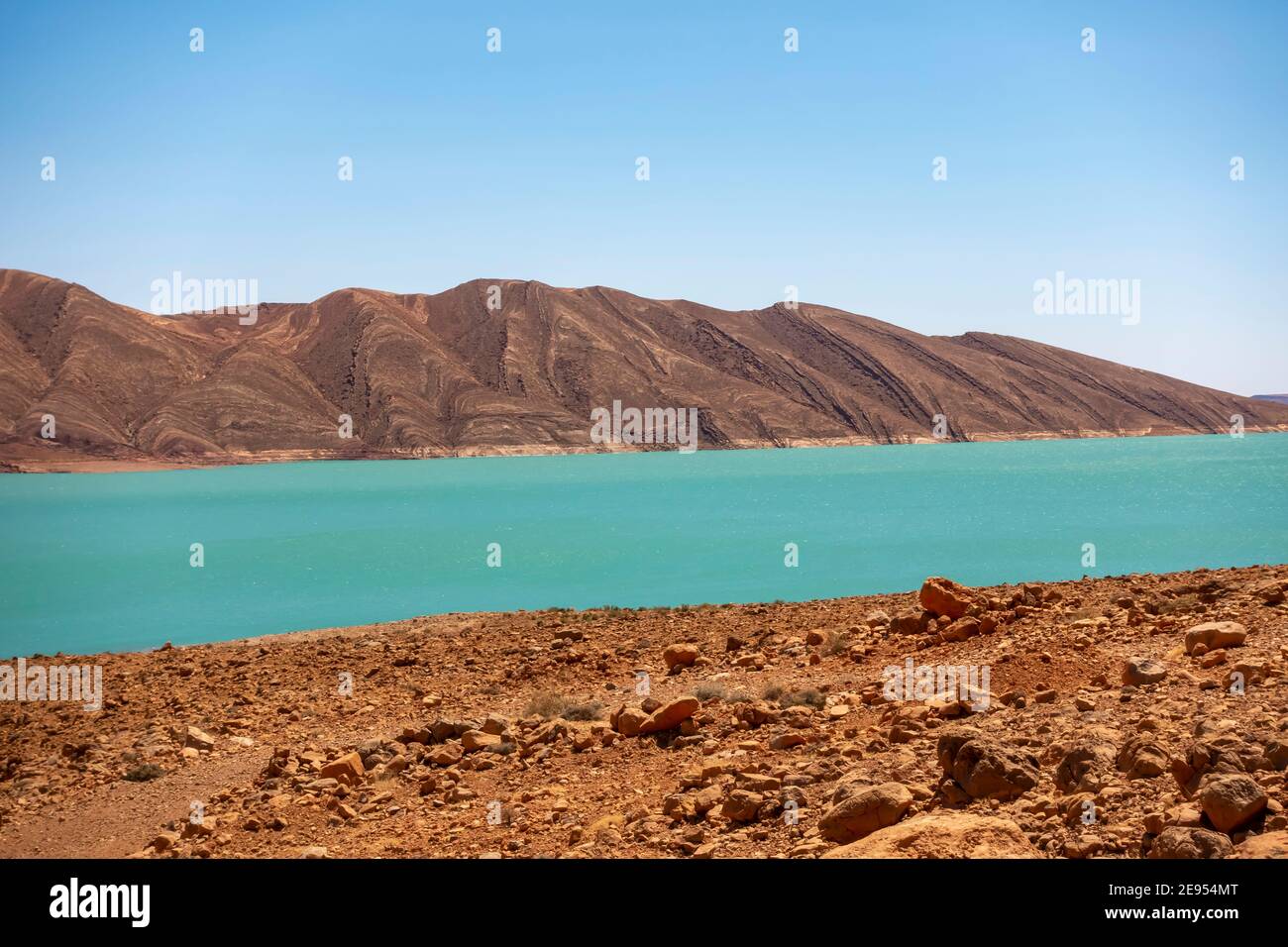 Water reservoir in Atlas Mountains of Morocco in a sunny day, North Africa Stock Photo