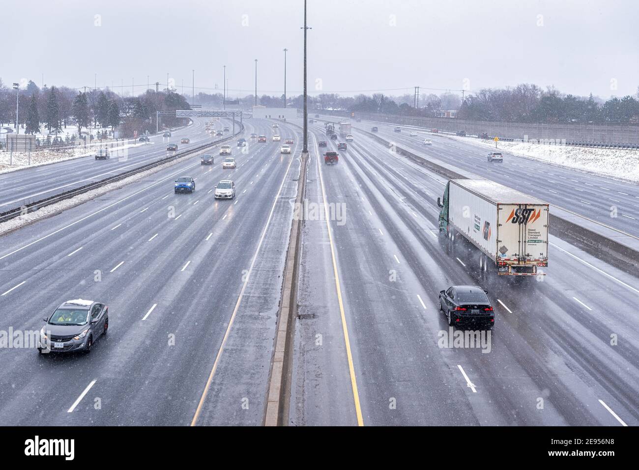 Toronto highway 401 during a snowfall in Winter, Canada Stock Photo