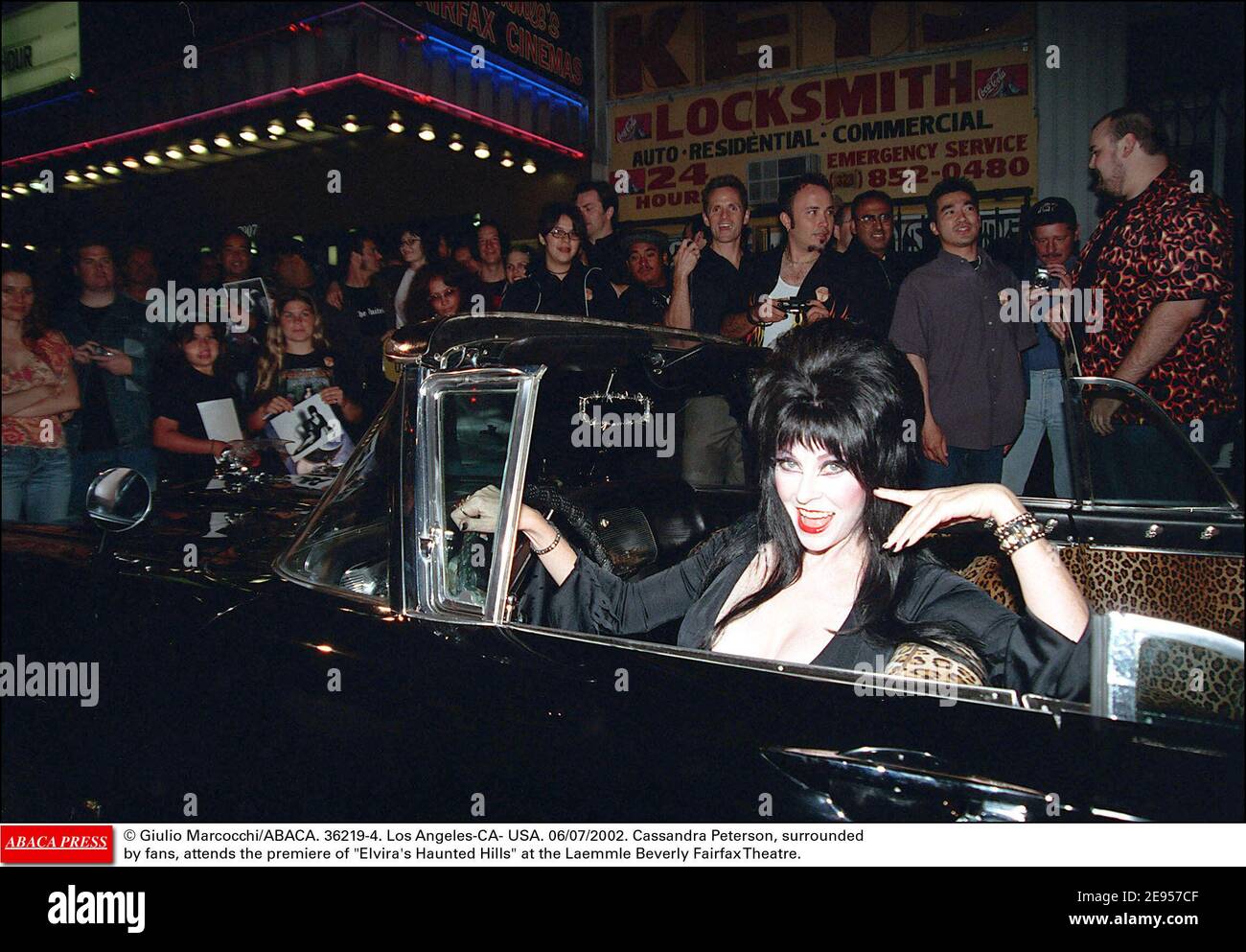 © Giulio Marcocchi/ABACA. 36219-4. Los Angeles-CA- USA. 06/07/2002. Cassandra Peterson, surrounded by fans, attends the premiere of Elvira's Haunted Hills at the Laemmle Beverly Fairfax Theatre. Stock Photo