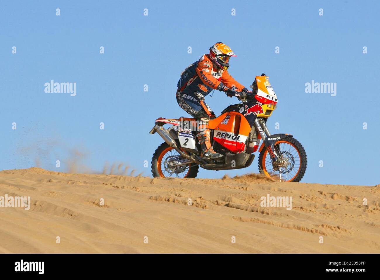 Spanish bike rider Marc Coma rides his KTM (002) through the 7nd stage of  the 2006 Lisbon-Dakar rally between Zouerat and Atar, Mauritania on January  6, 2006. The 28th Dakar Rally started