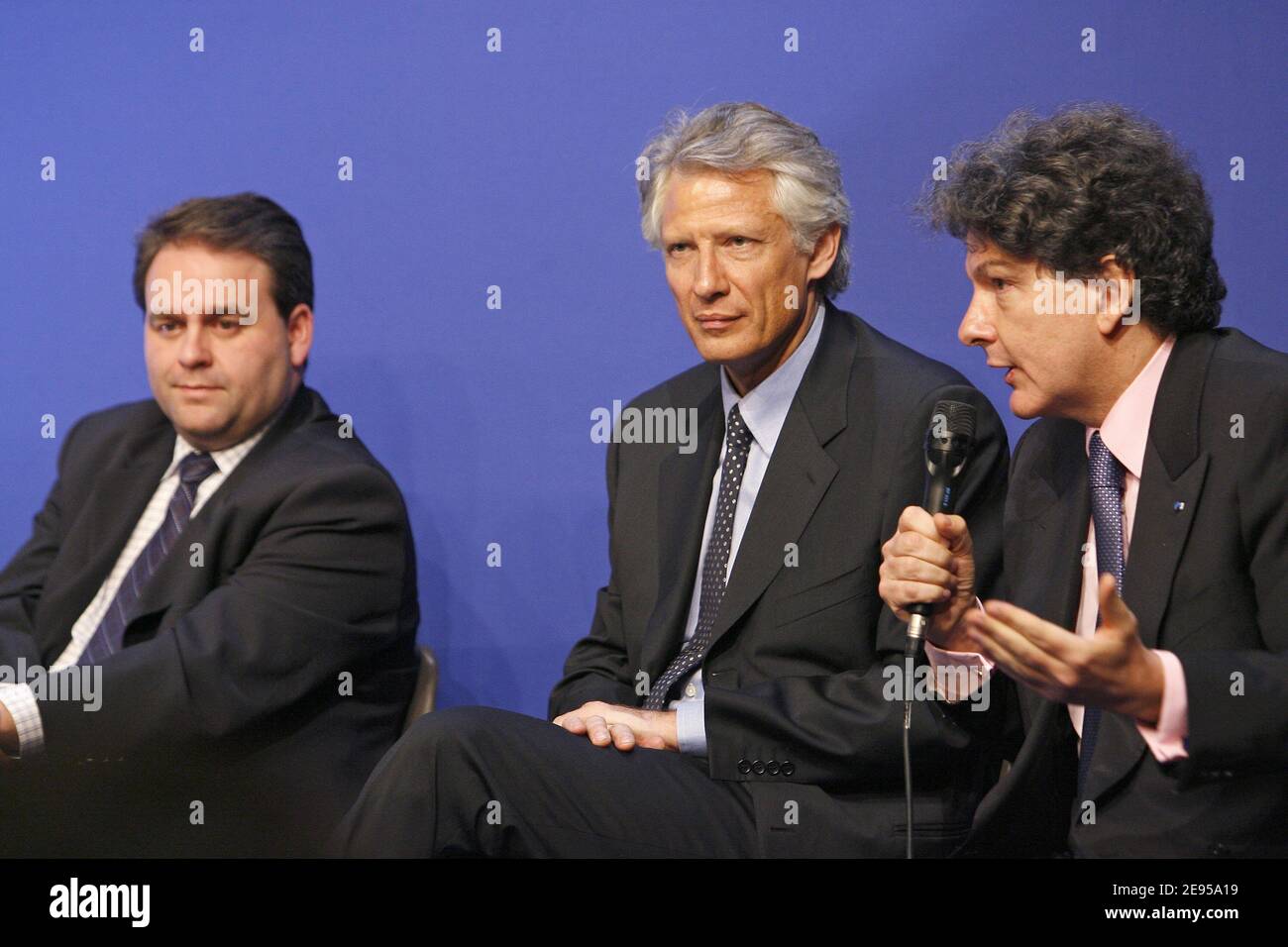(L to R) Xavier Bertrand, Minister for the Health and Solidarity, Prime Minister Dominique de Villepin with Thierry Breton, Minister for the Economy, Finance and Industry present plans to reduce the country's massive debt during a meeting on public finances in Paris, France, on January 12, 2006. Photo by Mehdi Taamallah/ABACAPRESS.COM Stock Photo