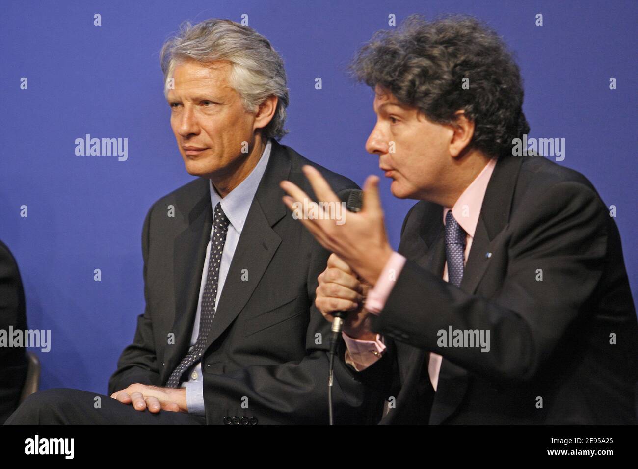 Prime Minister Dominique de Villepin with Thierry Breton, Minister for the Economy, Finance and Industry present plans to reduce the country's massive debt during a meeting on public finances in Paris, France, on January 12, 2006. Photo by Mehdi Taamallah/ABACAPRESS.COM Stock Photo