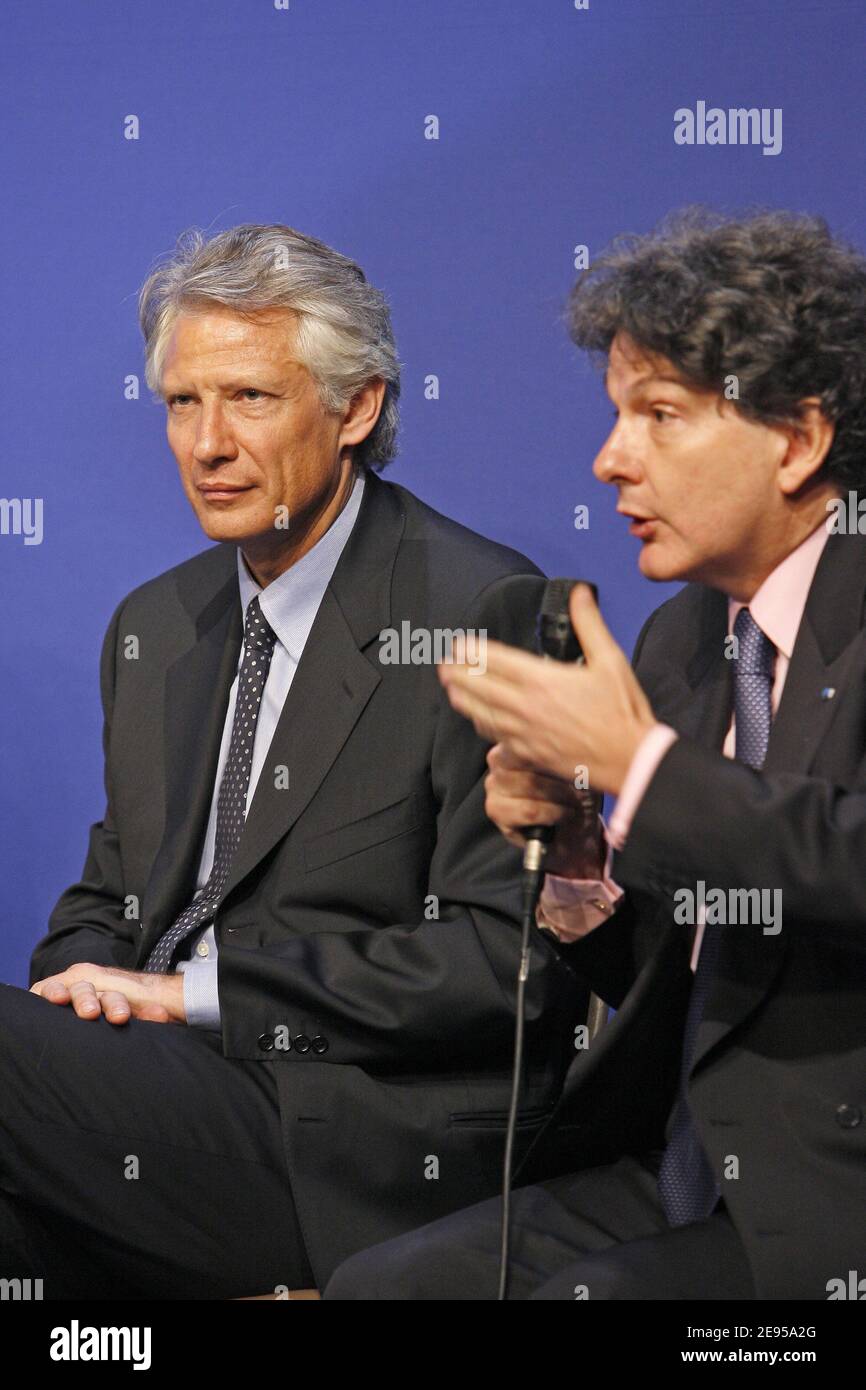 Prime Minister Dominique de Villepin with Thierry Breton, Minister for the Economy, Finance and Industry present plans to reduce the country's massive debt during a meeting on public finances in Paris, France, on January 12, 2006. Photo by Mehdi Taamallah/ABACAPRESS.COM Stock Photo