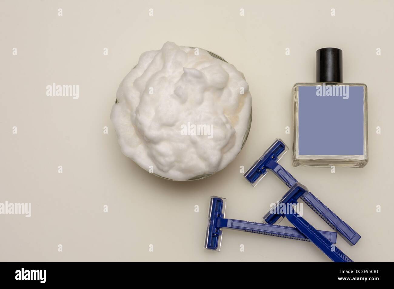 Styrofoam Razor Shaving supplies: foam, razors and aftershave. Top view, white ...