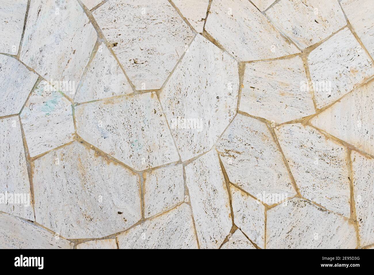 wall made of stones and concrete as background and wallpaper Stock Photo