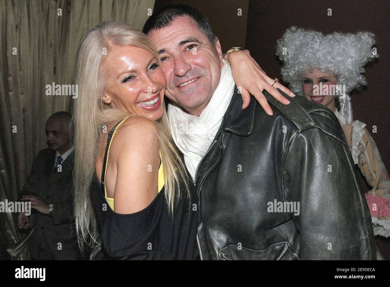 French actor Jean-Marie Bigard with his wife Claudia attend 'Le Bourgeois  Gentilhomme' premiere after party held at 'L'Etoile' in Paris, France, on  January 20, 2006. Photo by Benoit Pinguet/ABACAPRESS.COM Stock Photo -