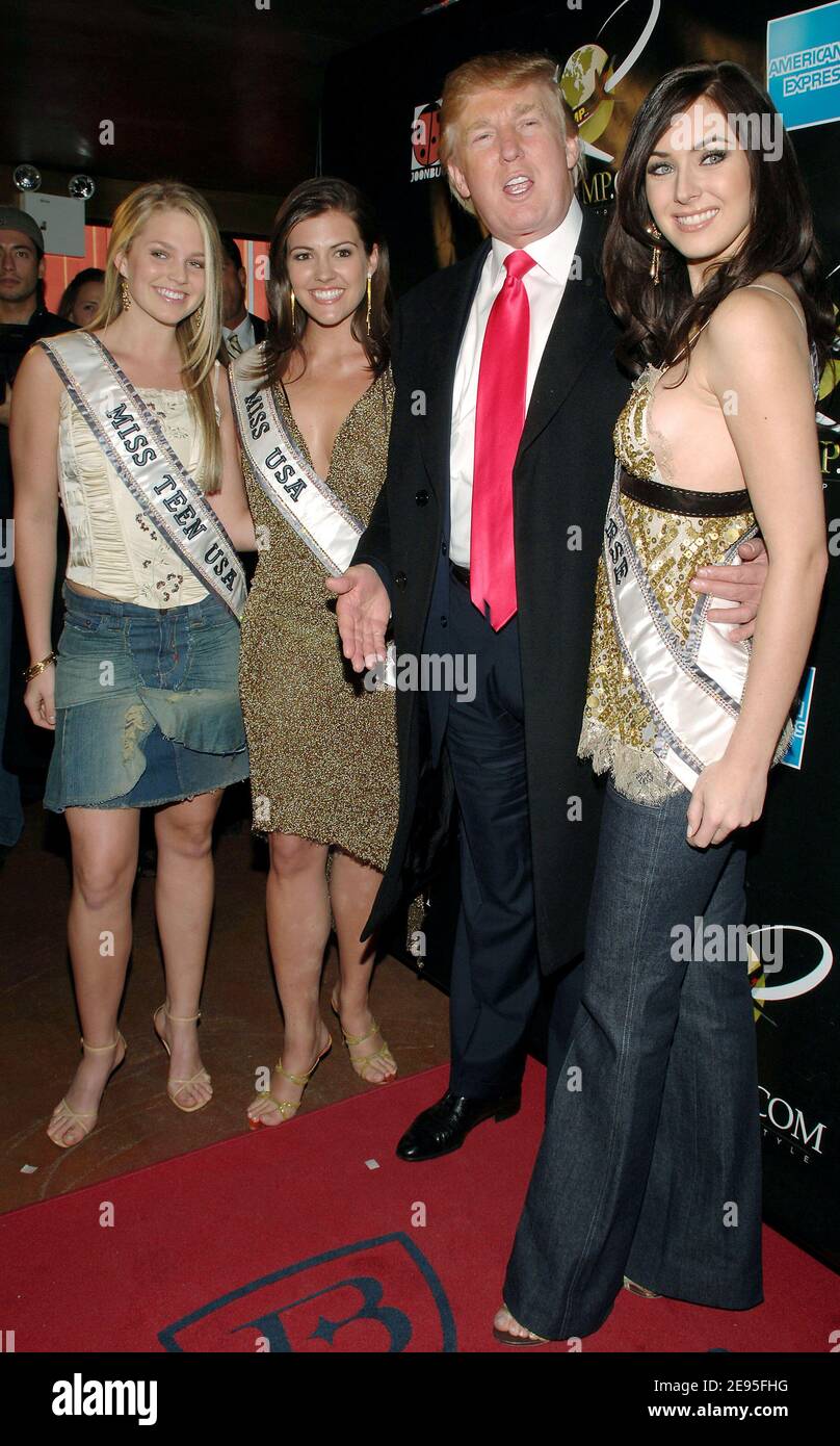 'Billionaire Donald Trump poses with Miss Universe Natalie Glebova, Miss USA Chelsea Cooley and Miss Teen USA Allie Laforce at the launch party for his brand new high end travel website ''GoTrump.com'', held at Marquee in New York, USA on Tuesday, January 24, 2006. Photo by Nicolas Khayat/ABACAPRESS.COM' Stock Photo