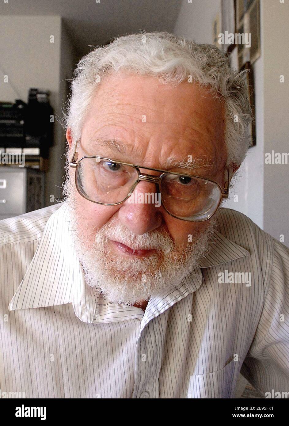 EXCLUSIVE - Author William Blum who got a big boost from Ossama bin Laden latest tape poses in his appartement in Washington DC, USA on Tuesday January 24, 2006. Blum, 72, is still adjusting after Osama bin Laden told the world that the American people should read his book 'Rogue State'. William Blum says that he is not repulsed by Bin Laden embrace of his book. 'Rogue State' shot up from 205,763 to 26 on Amazon.com's index of the most-ordered books. Photo by Olivier Douliery/ABACAPRESS.COM Stock Photo