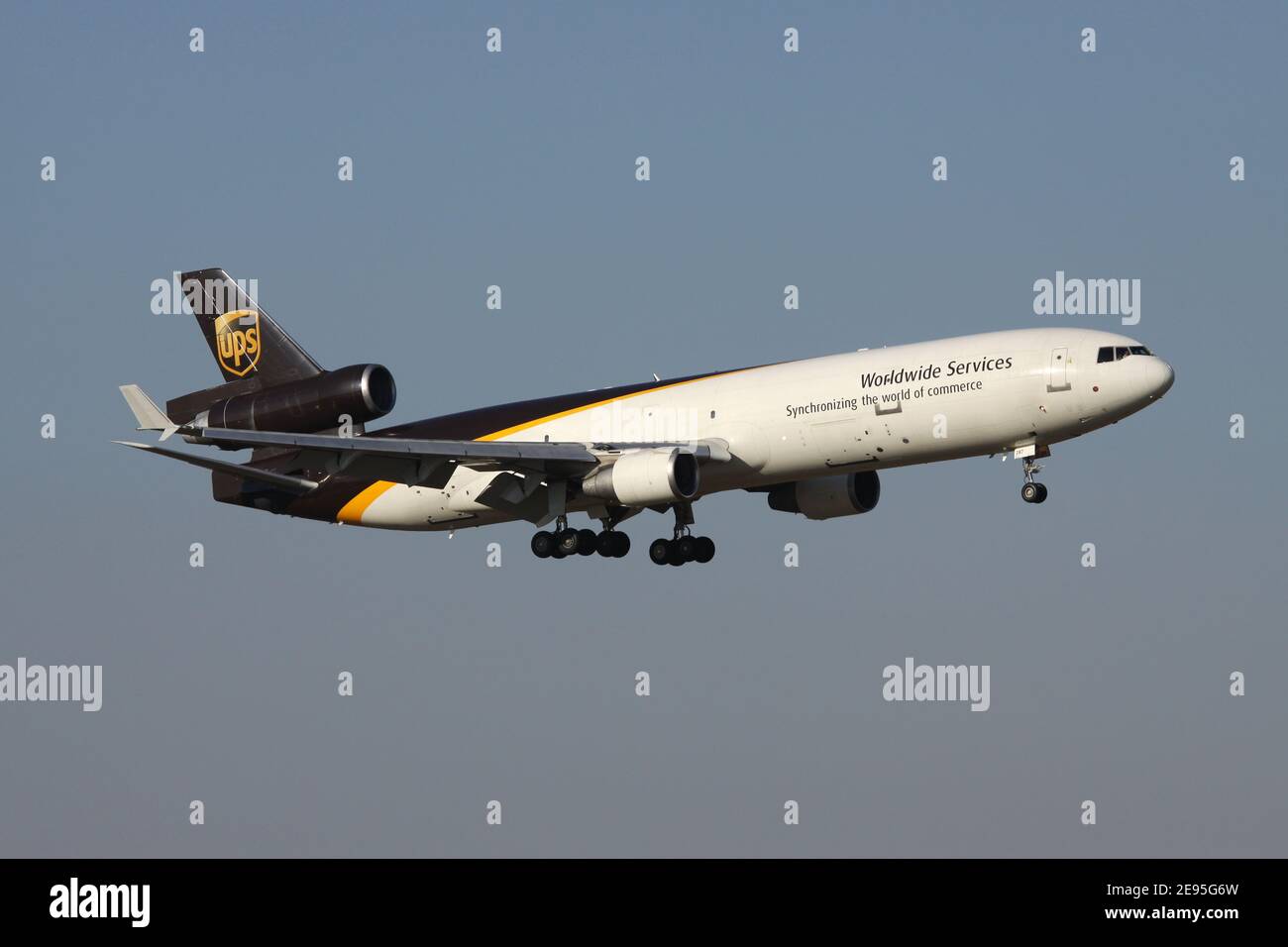 UPS McDonnell Douglas MD-11F with registration N287UP on final for runway 14L of Cologne Bonn Airport. Stock Photo