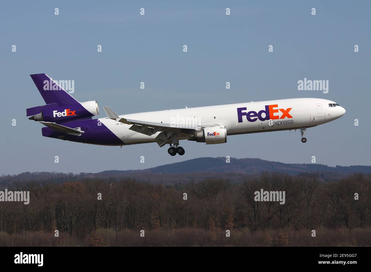 FedEx McDonnell Douglas MD-11F with registration N589UP on short final for runway 14L of Cologne Bonn Airport. Stock Photo