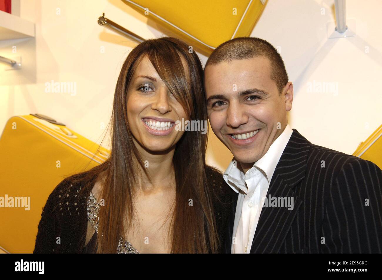 Singer Faudel and his wife attend the Lancel store opening party on the Champs Elysees in Paris, France, on January 26, 2006. Photo by Nicolas Gouhier/ABACAPRESS.COM Stock Photo