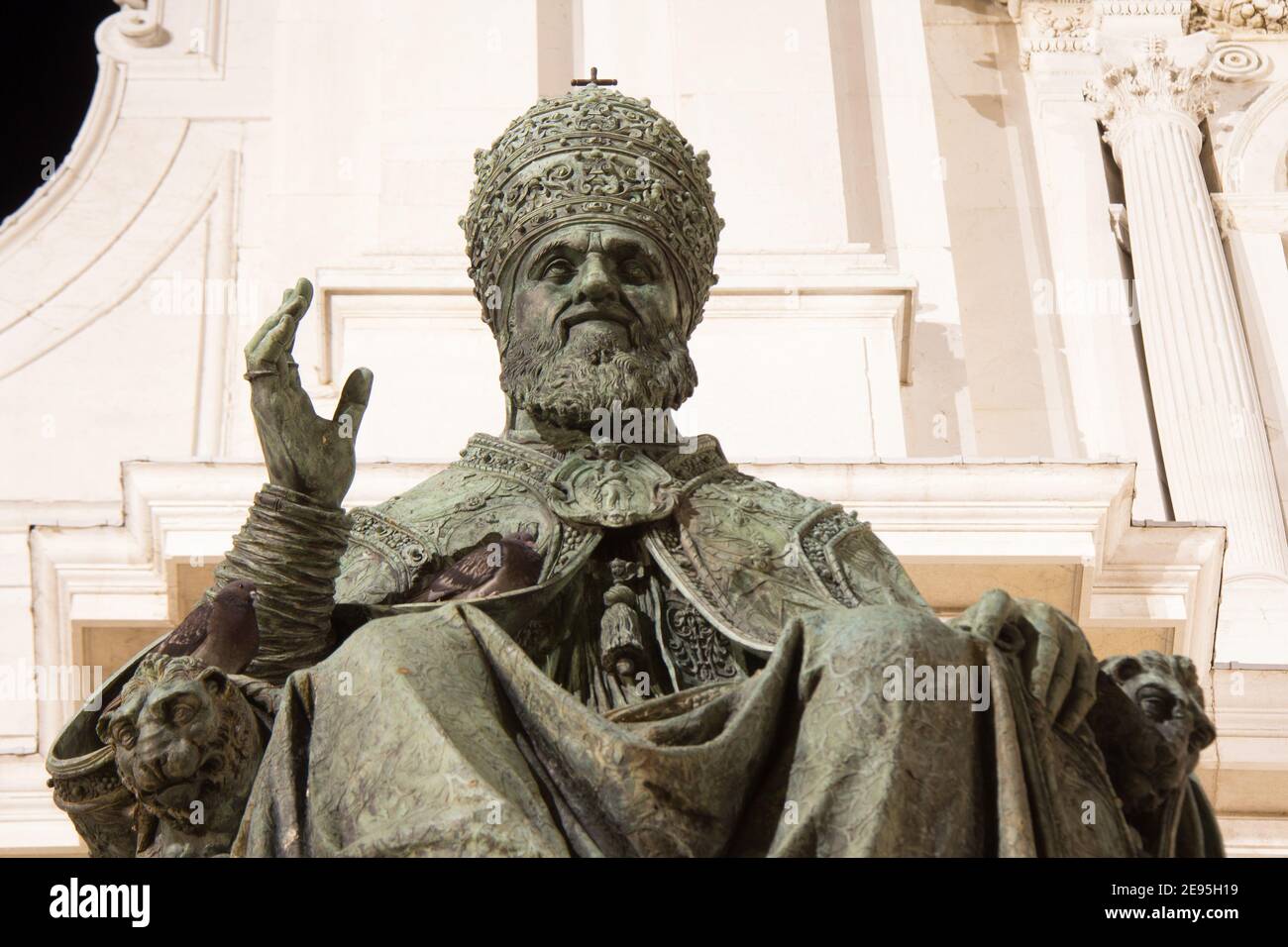 Loreto, Marche, province of Ancona:August 22,2020 View of the monument to Pope Sixtus V, the blessing of the bronze statue from the chair and the Stock Photo
