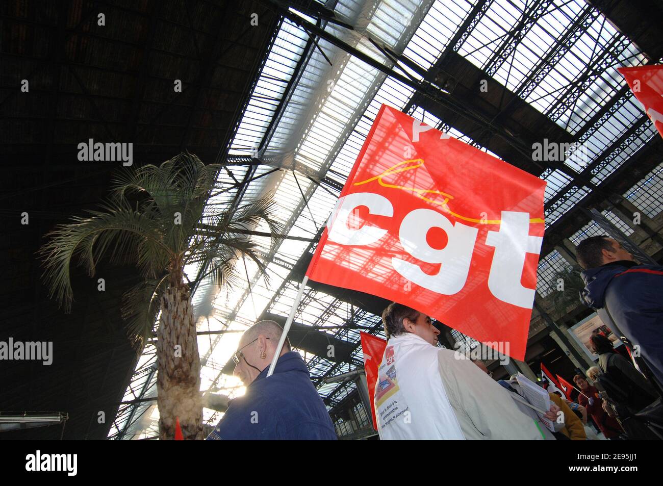 CGT trade unionists protest during the inauguration of the train ...