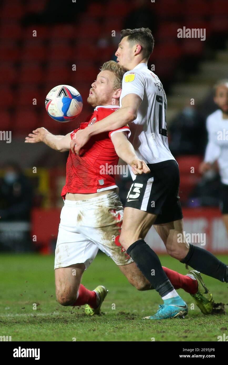 London, UK. 2nd Feb 2021. Jayden Stockley of Charlton and James Bolton of Portsmouth battle for the ballduring the Sky Bet League 1 match between Charlton Athletic and Portsmouth at The Valley, London on Tuesday 2nd February 2021. (Credit: Federico Maranesi | MI News) Credit: MI News & Sport /Alamy Live News Stock Photo