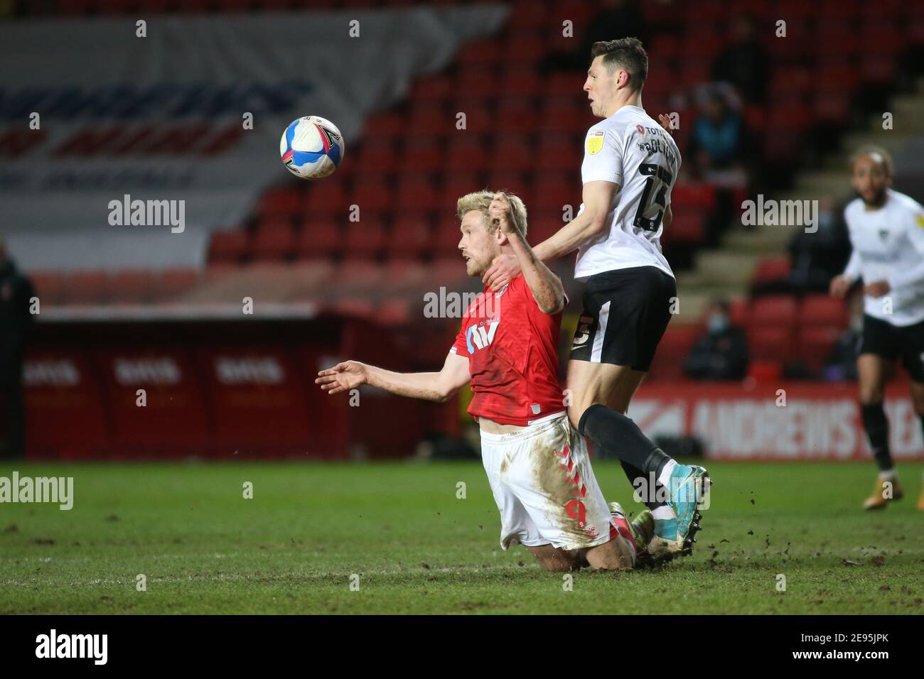 London, UK. 2nd Feb 2021. Jayden Stockley of Charlton and James Bolton of Portsmouth battle for the ballduring the Sky Bet League 1 match between Charlton Athletic and Portsmouth at The Valley, London on Tuesday 2nd February 2021. (Credit: Federico Maranesi | MI News) Credit: MI News & Sport /Alamy Live News Stock Photo