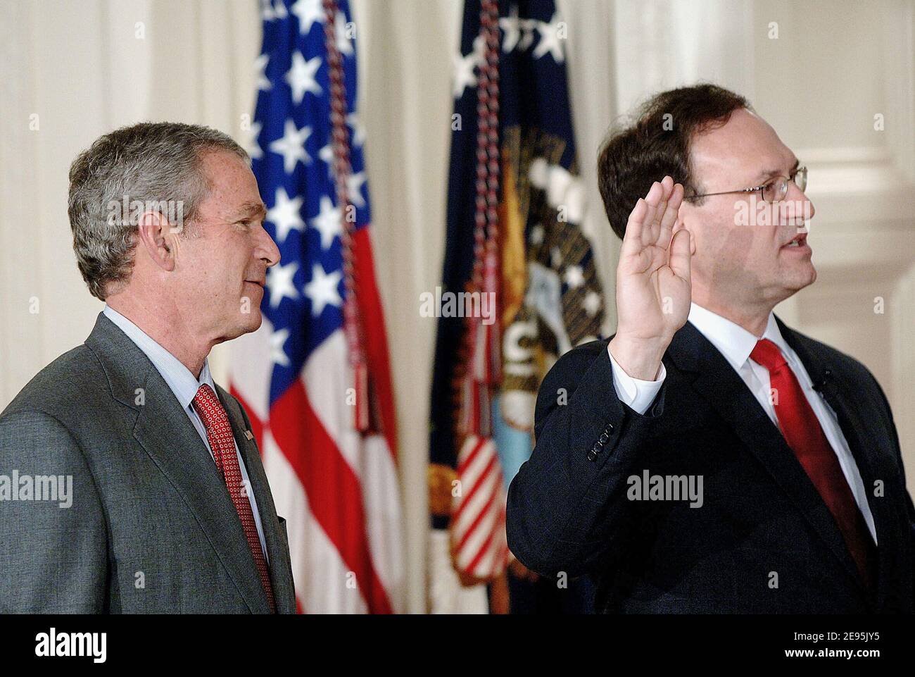 U.S. Supreme Court Justice Samuel Alito is sworn in as President Bush looks on during a ceremonial swearing-in at the East Room of the White House February 1, 2006 in Washington, DC. Photo by Olivier Douliery/ABACAPRESS.COM Stock Photo
