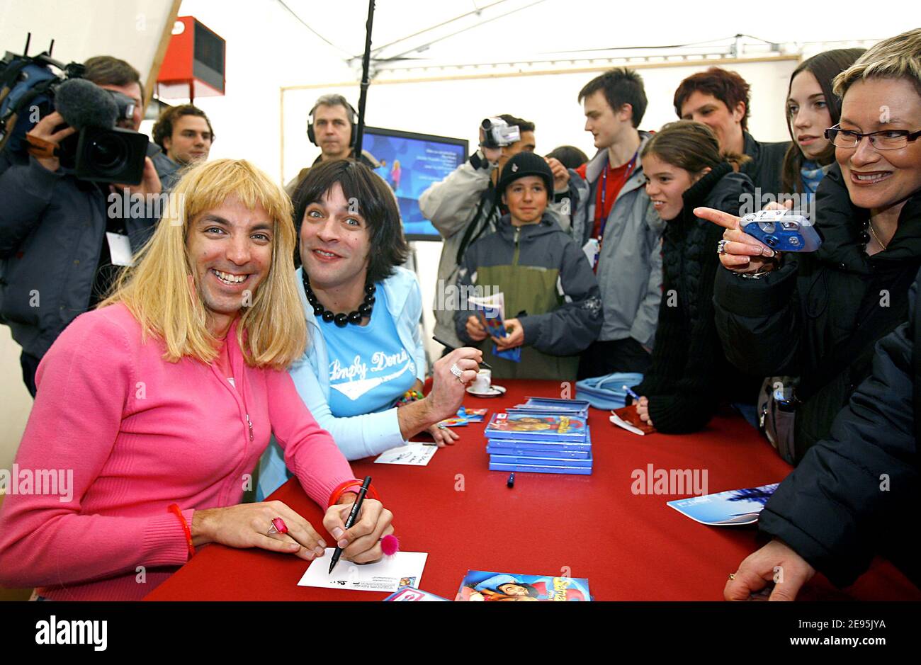 French humorists Doudi (aka David Strajmayster) (Blond hair or white shirt) and Pepess (aka Guillaume Carcaud) playing Samantha and Chantal in French TV show 'Samantha Oups' pose during the 8th International Television Film Festival of Luchon in French Pyrenees on February 1, 2006. Photo by Patrick Bernard/ABACAPRESS.COM Stock Photo