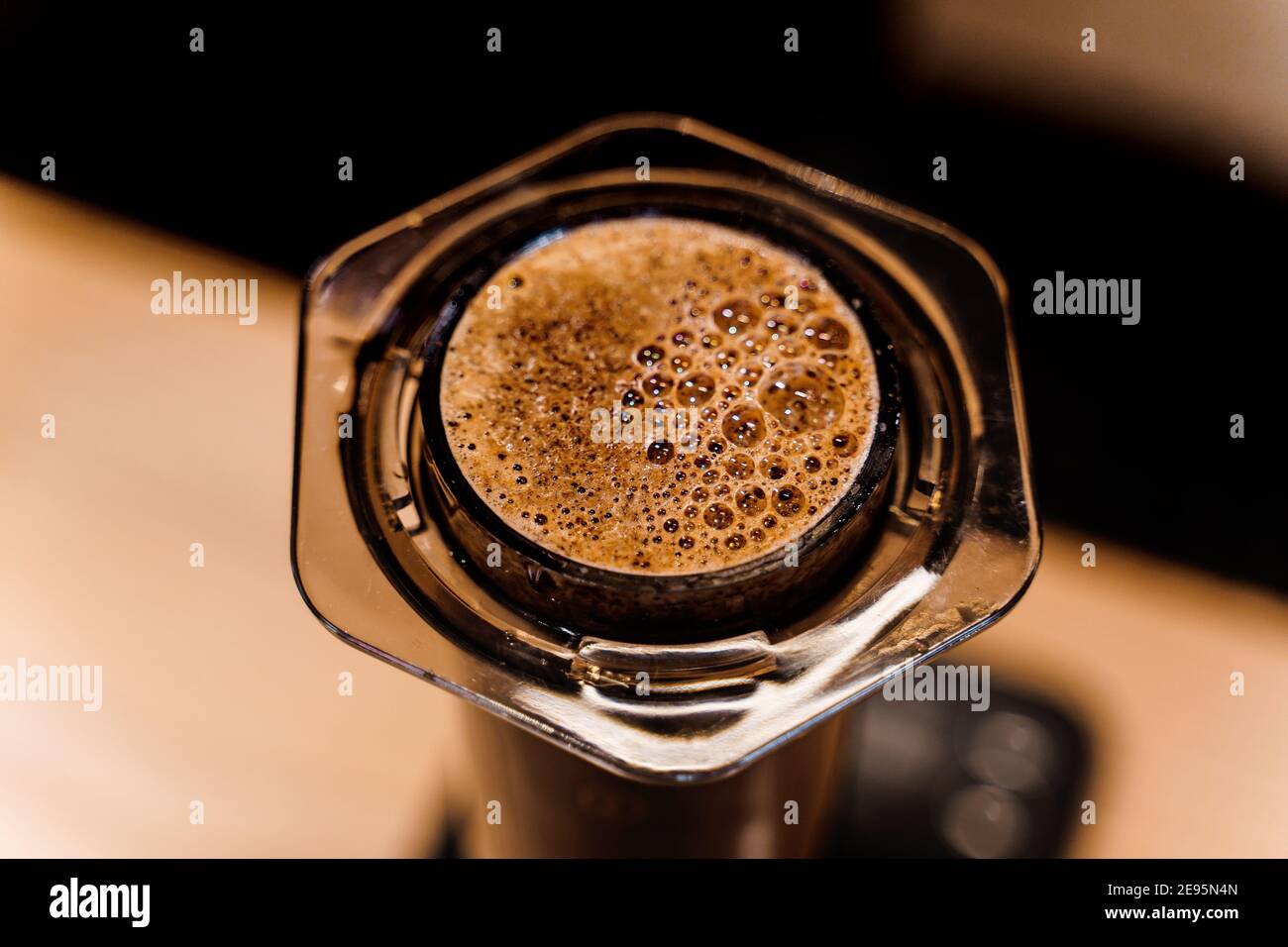 Alternative method of making coffee, funnel drip glasses with paper filter  and aeropress Stock Photo - Alamy
