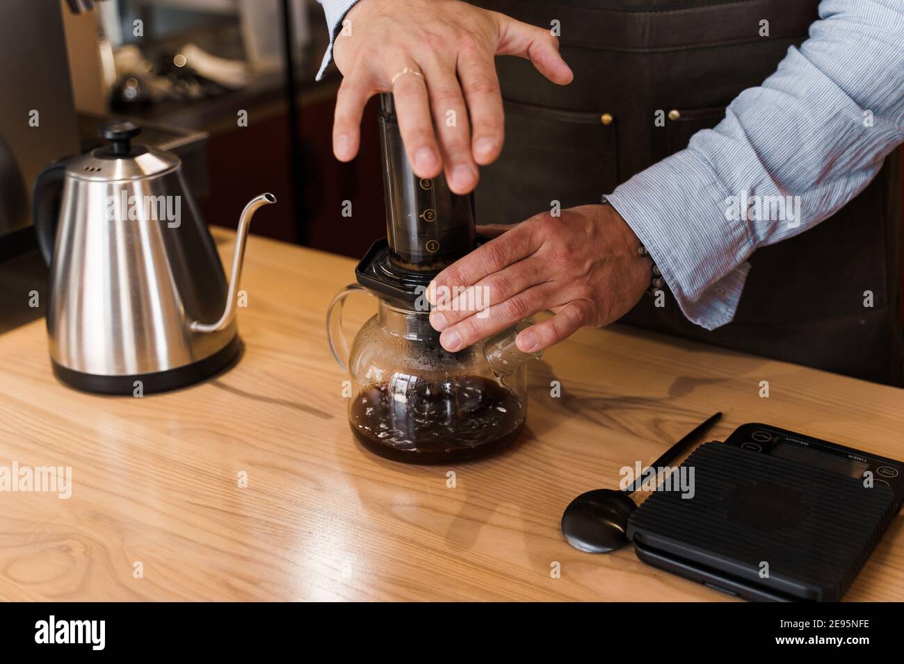 Aeropress Coffee and Glass Pot Close-up: Barista Press To Device and Coffee  Drops Pours Trought Aeropress To Pot Stock Photo - Image of method, coffee:  222093800