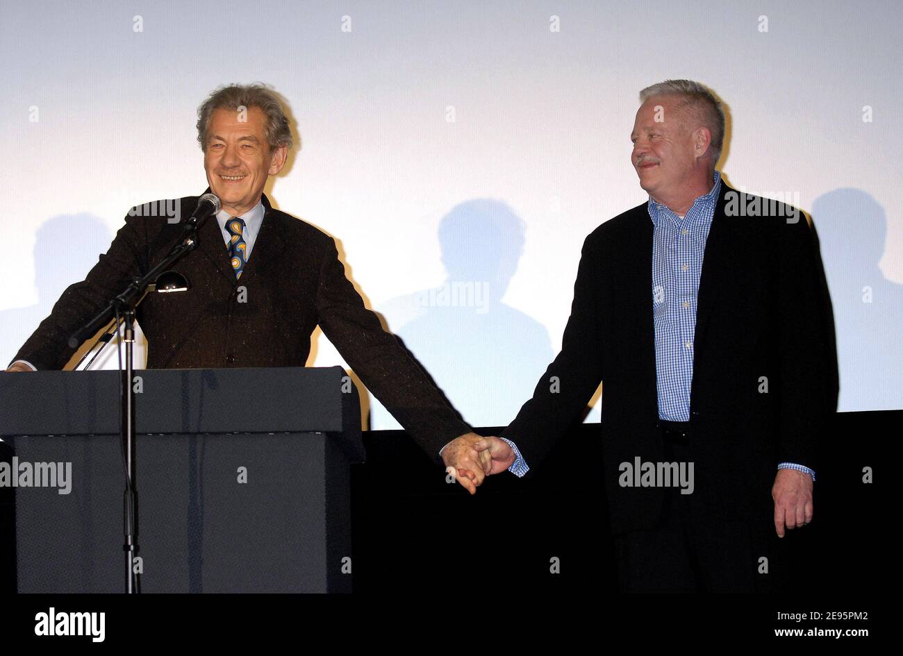 British actor Sir Ian McKellen hand by hand with US writer Armistead Maupin during honoring ceremony for Ian McKellen for his lifetime achievements with a 'Golden Bear' at the 56th Berlinale, International Film Festival in Berlin, Germany, on February 11, 2006. Photo by Bruno Klein/ABACAPRESS.COM Stock Photo