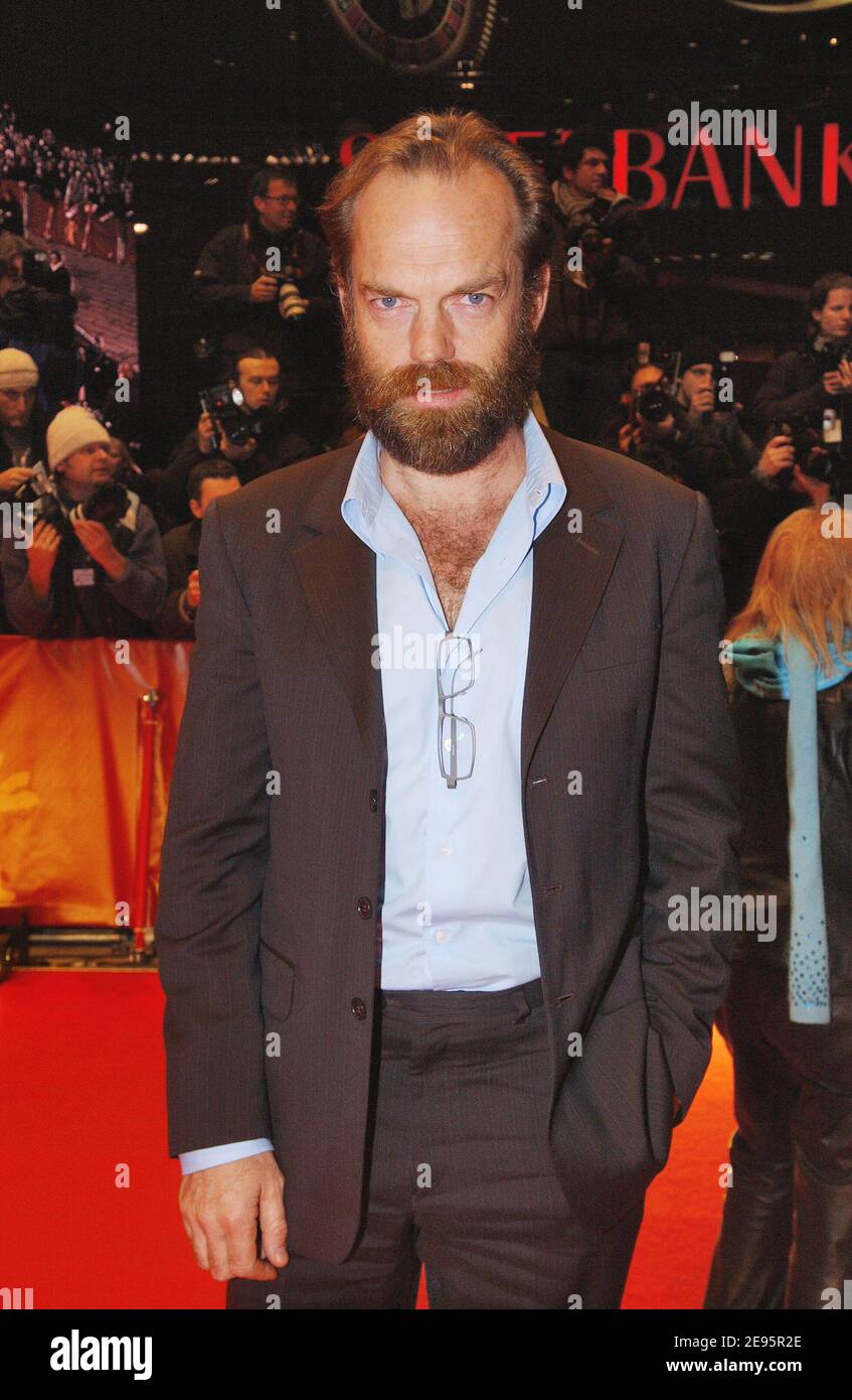 Hugo Weaving speaks to a TV reporter upon his arrival for the Tokyo premier  of his latest film V for Vendetta Monday, April 17, 2006. The political  action thriller, that stars Weaving