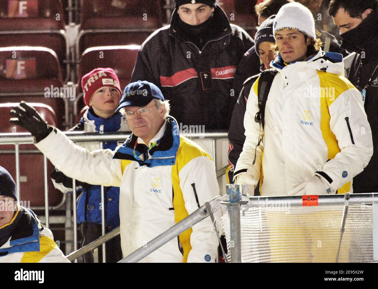 King Carl Gustav of Sweden and Prince Carl Philip attend the Alpine Skiing Men's Slalom at the Olympic Winter Games in Sestrieres, Italy, on February 25, 2006. Photo by Nicolas Gouhier/Cameleon/ABACAPRESS.COM Stock Photo