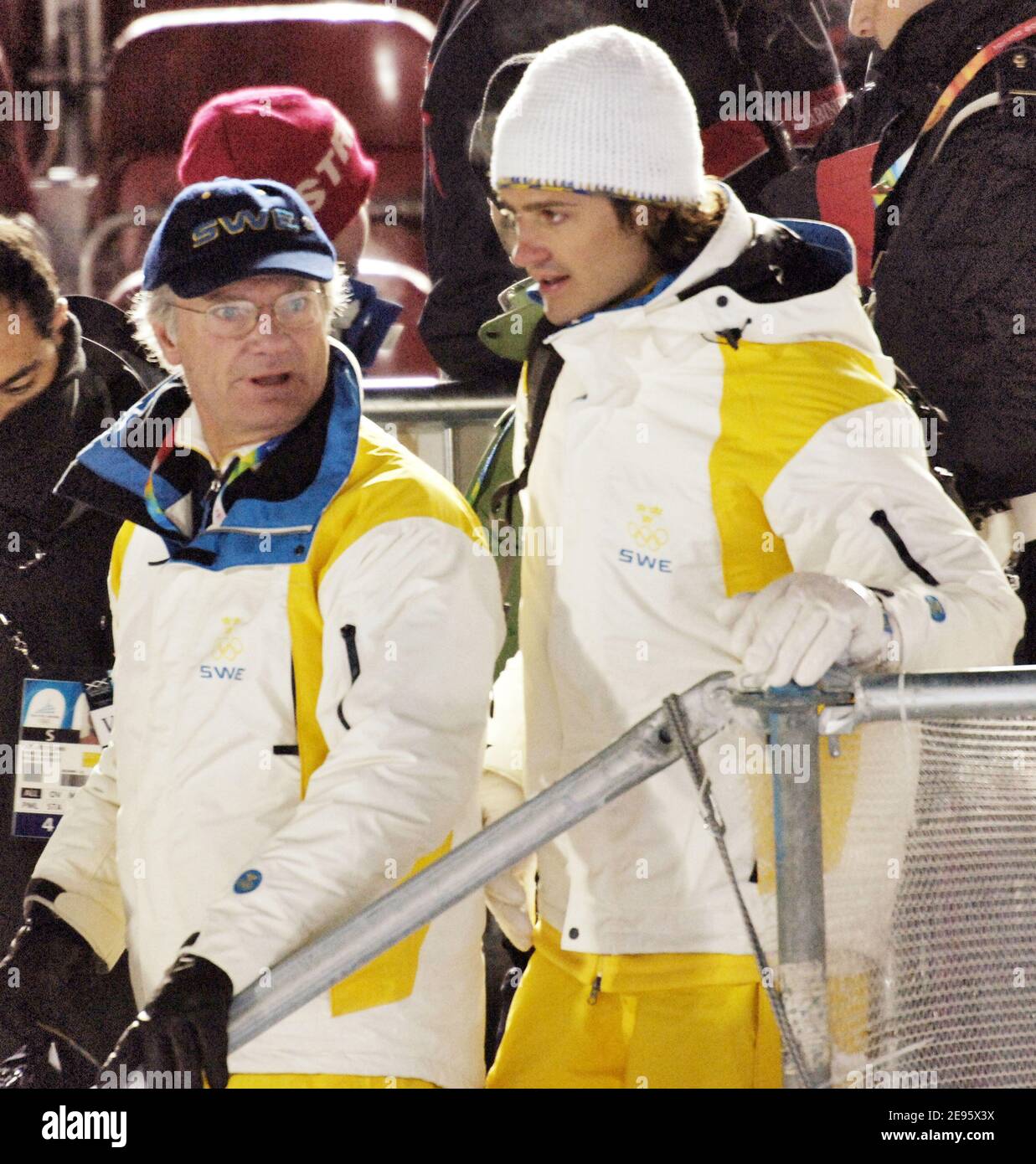 King Carl Gustav of Sweden and Prince Carl Philip attend the Alpine Skiing Men's Slalom at the Olympic Winter Games in Sestrieres, Italy, on February 25, 2006. Photo by Nicolas Gouhier/Cameleon/ABACAPRESS.COM Stock Photo