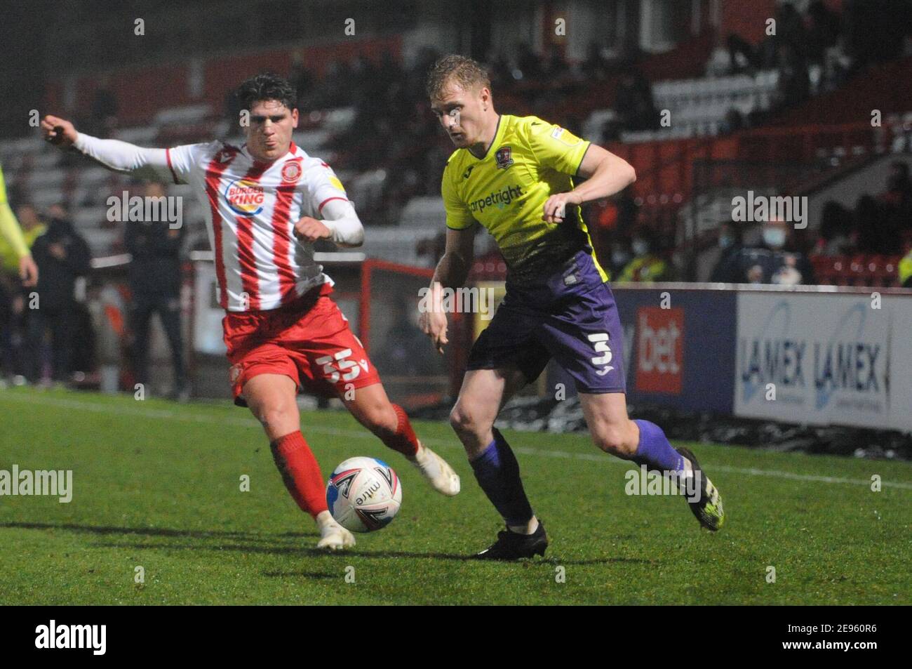 Stevenage, Hertfordshire, UK. 2nd Feb 2021. Exeters Jack Sparkes and Stevenages Matt Stevens during the Sky Bet League 2 match between Stevenage and Exeter City at the Lamex Stadium, Stevenage on Tuesday 2nd February 2021. (Credit: Ben Pooley | MI News) Credit: MI News & Sport /Alamy Live News Stock Photo