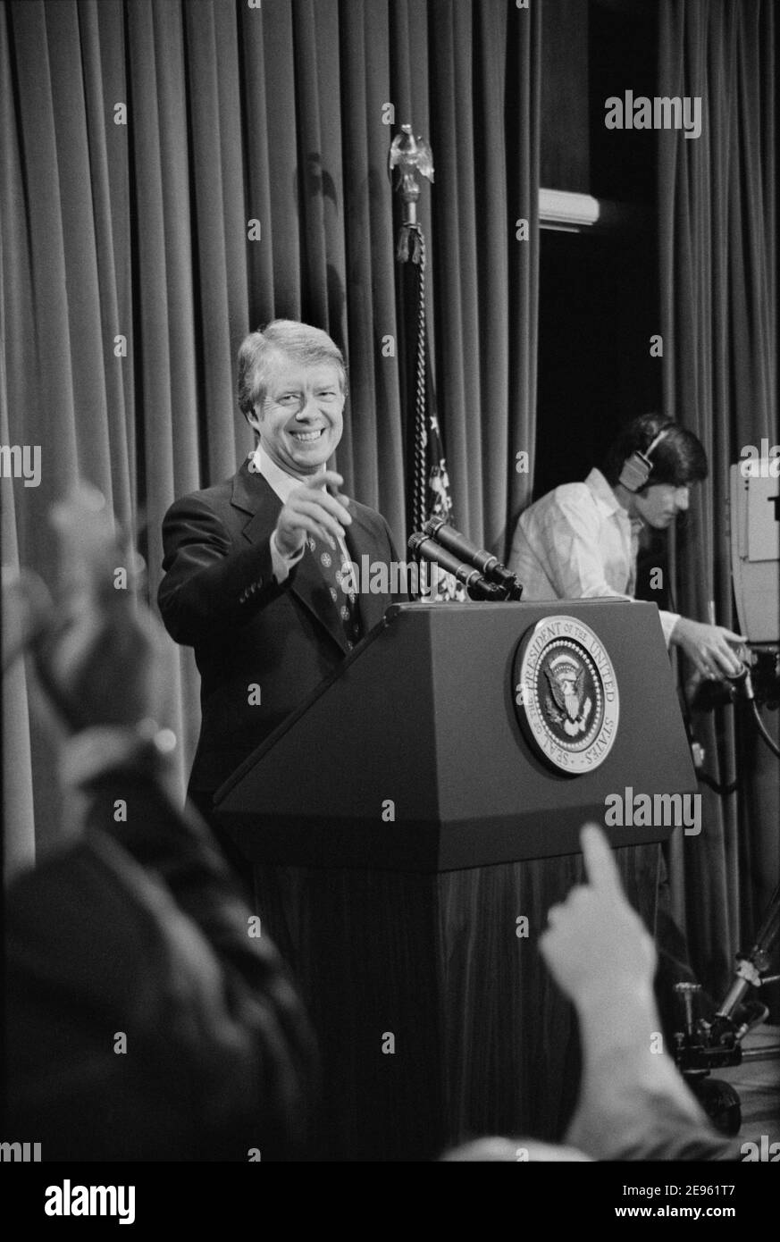U.S. President Jimmy Carter at a press conference, taking a question, Washington, D.C., USA, Marion S. Trikosko, June 30, 1977 Stock Photo