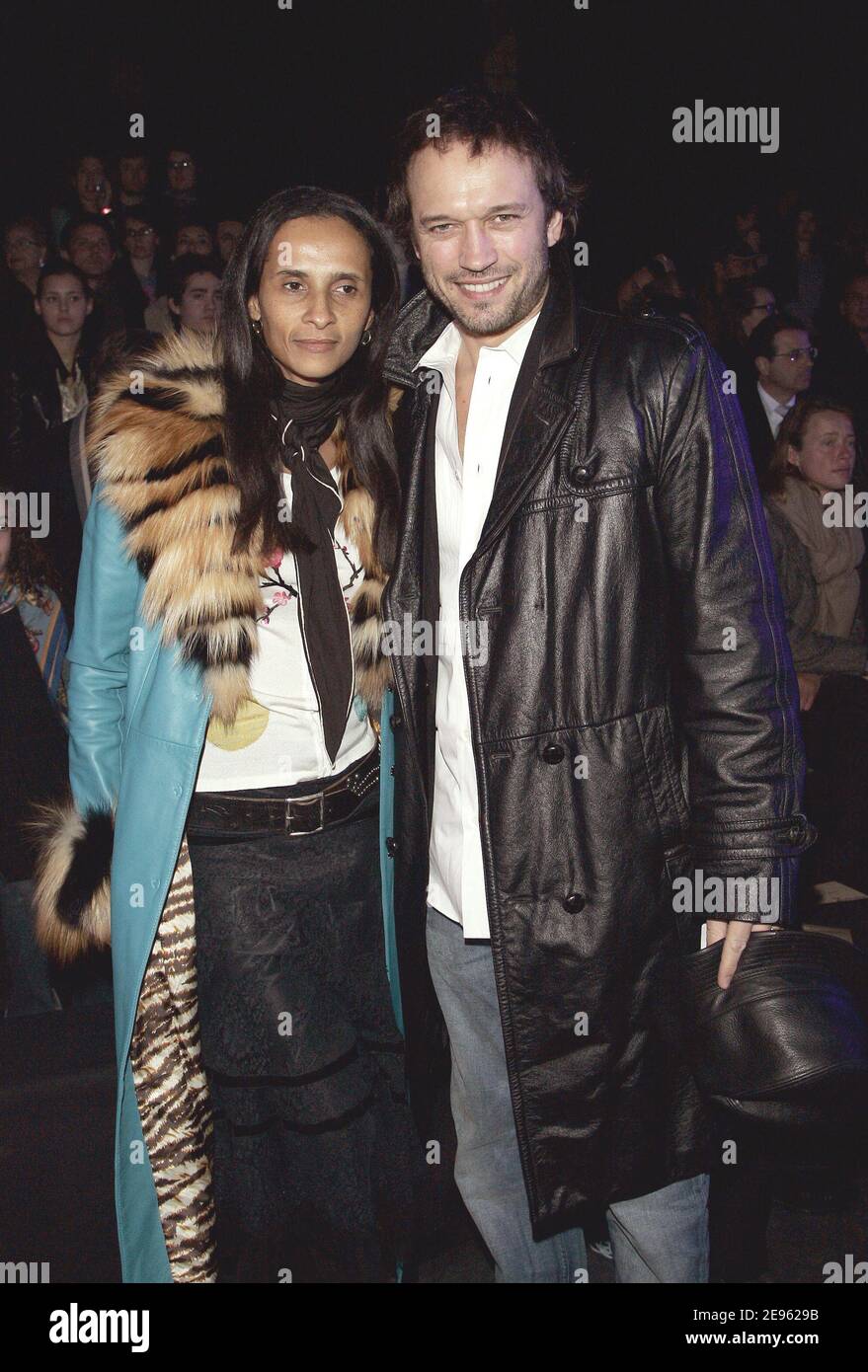 Swiss actor Vincent Perez and his wife Karine Sylla during John Galliano's Fall-Winter 2006-2007 Ready-to-wear collection presentation held at 'Dock Eiffel' in Paris, France, on March 4, 2006. Photo by Taamallah-Orban-Zabulon/ABACAPRESS.COM Stock Photo