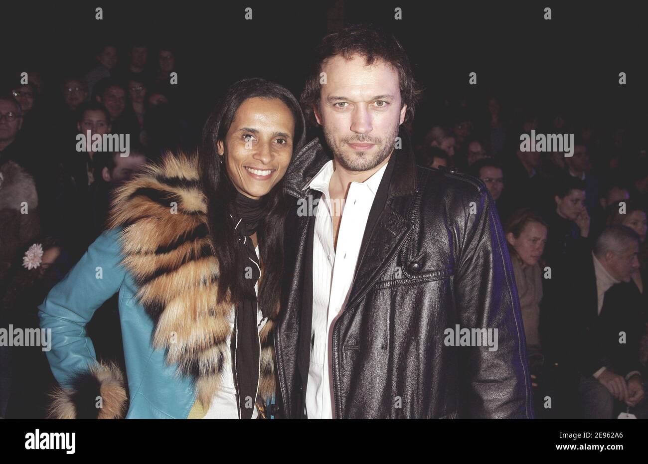 Swiss actor Vincent Perez and his wife Karine Sylla during John Galliano's Fall-Winter 2006-2007 Ready-to-wear collection presentation held at 'Dock Eiffel' in Paris, France, on March 4, 2006. Photo by Taamallah-Orban-Zabulon/ABACAPRESS.COM Stock Photo