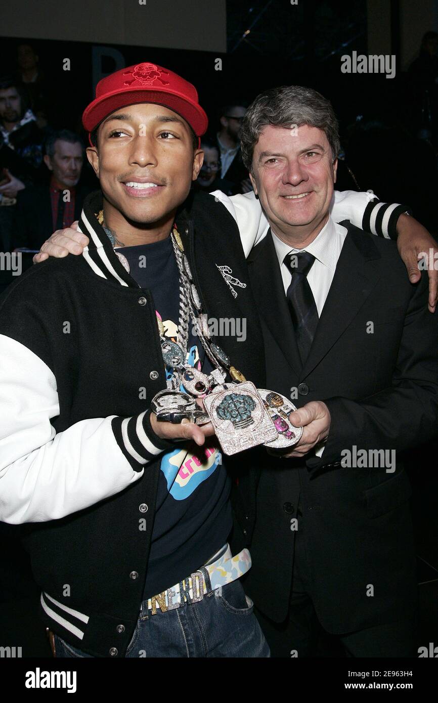 US singer Pharrell Williams and Louis Vuitton CEO Yves Carcelle