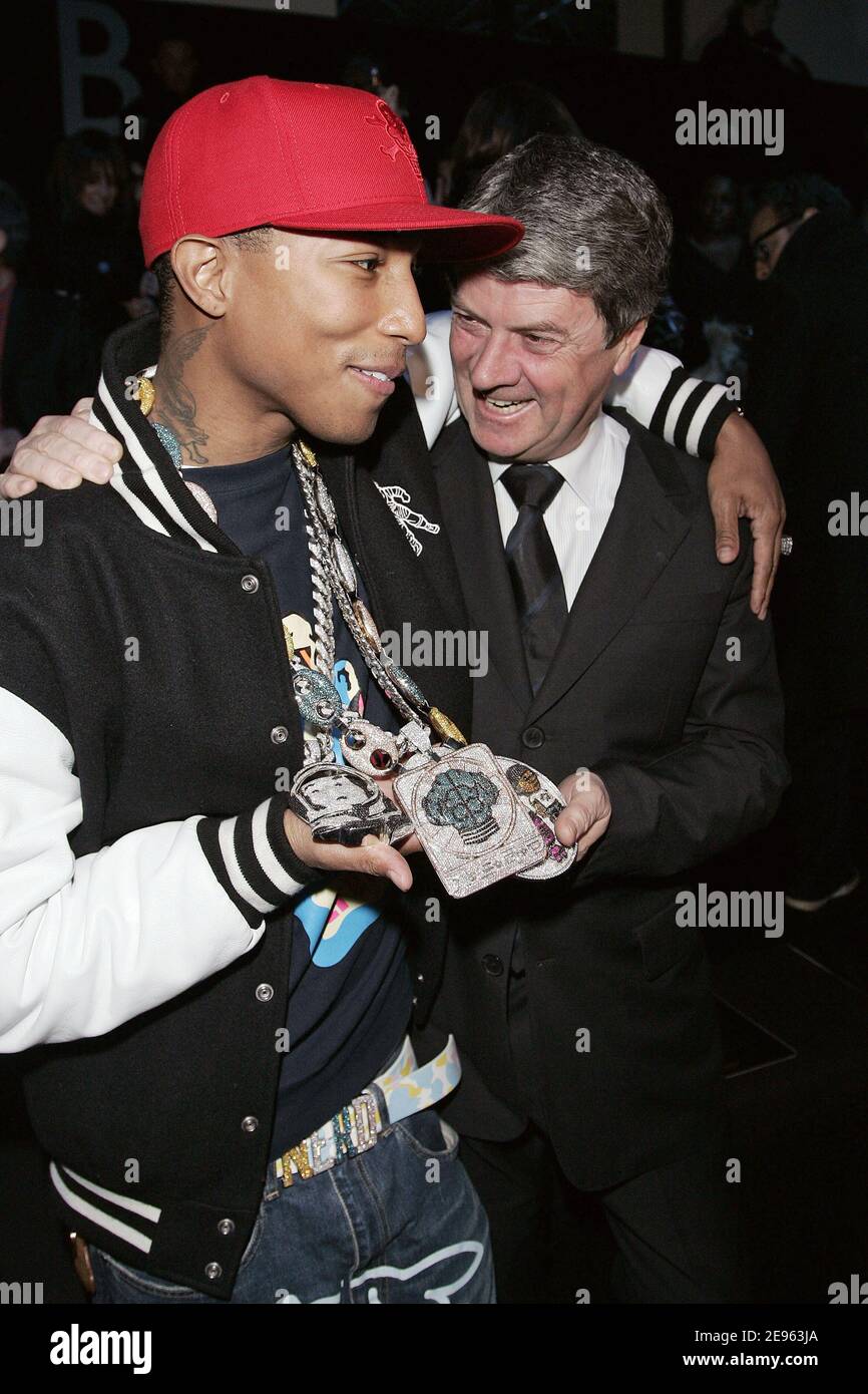 US singer Pharrell Williams and Louis Vuitton CEO Yves Carcelle