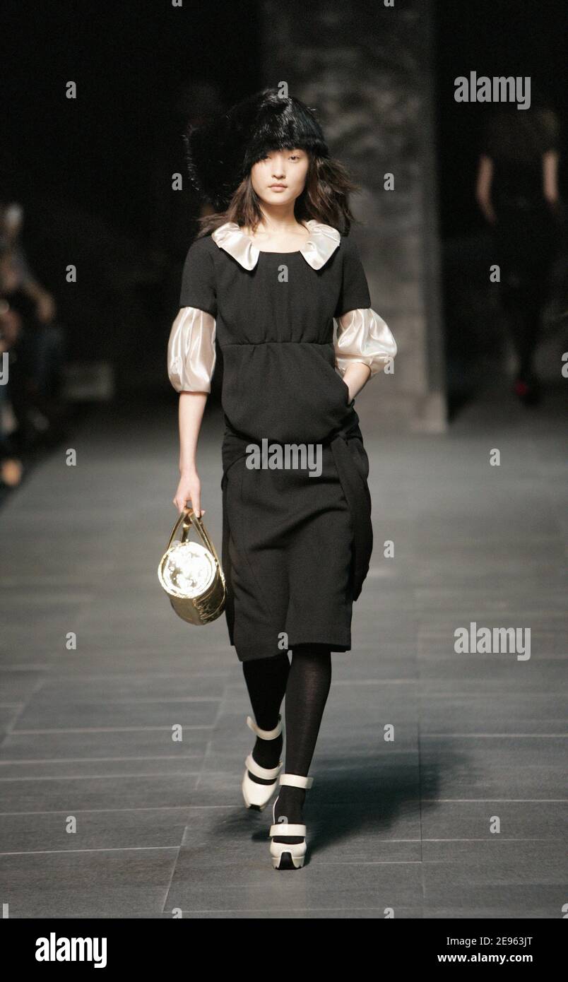 A model displays a creation by designer Marc Jacobs for the Louis Vuitton  Fall-Winter 2007-2008 Ready-To-Wear collection presentation, held at the '  Cour carree du louvre', in Paris, France, on March 4