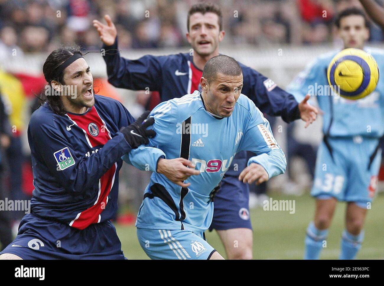 PSG's Mario Yepes and OM's Christian Gimenez in action during the French first league football match Paris Saint-Germain vs Olympique de Marseille at the Parc des Princes in Paris, France, on March 5, 2006. The game ended in a draw 0-0. Photo by Mehdi Taamallah/Cameleon/ABACAPRESS.COM Stock Photo