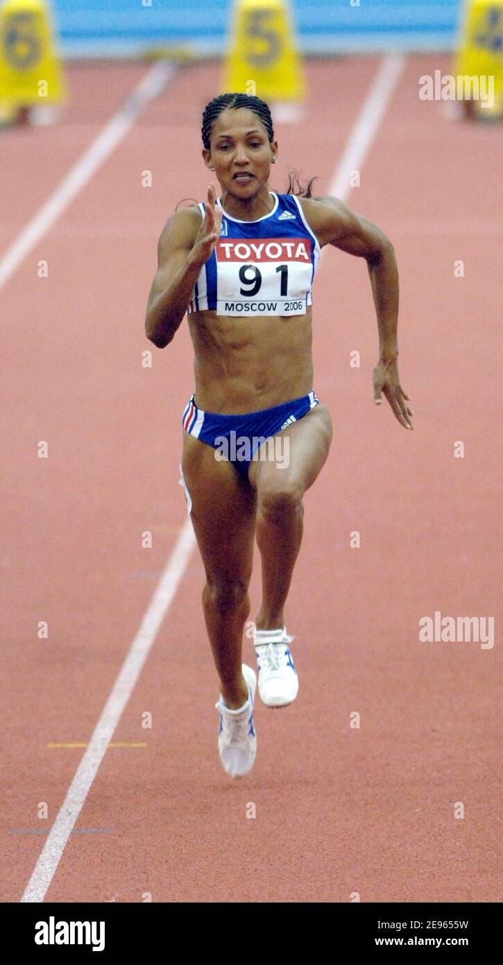 France's Christine Arron competes on women's 60 meters heat at the 11th