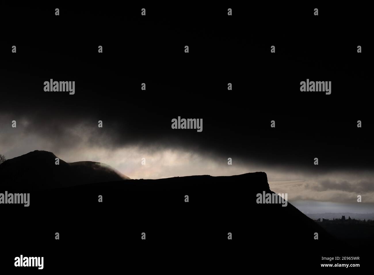 Arthur's Seat on a threatening winters day viewed from Carlton Hill, Edinburgh, Scotland, United Kingdom Stock Photo