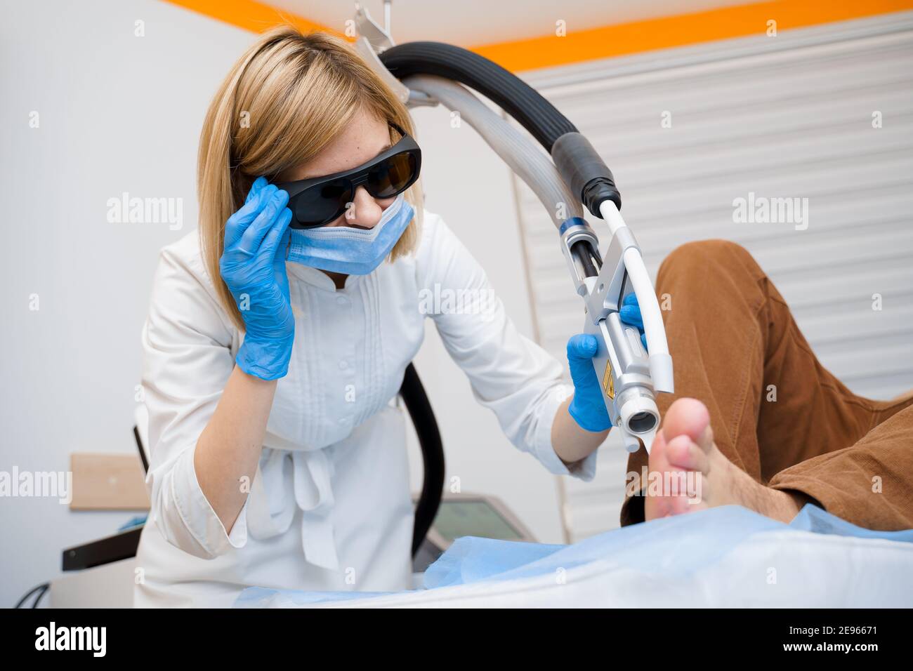 Laser removal of warts on the foot. Medical dermatological surgery in the clinic Stock Photo Alamy